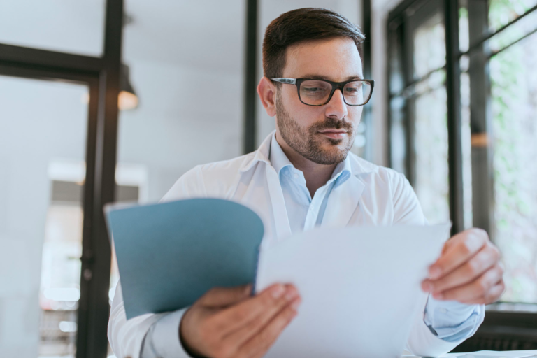 employee reading the employee handbook